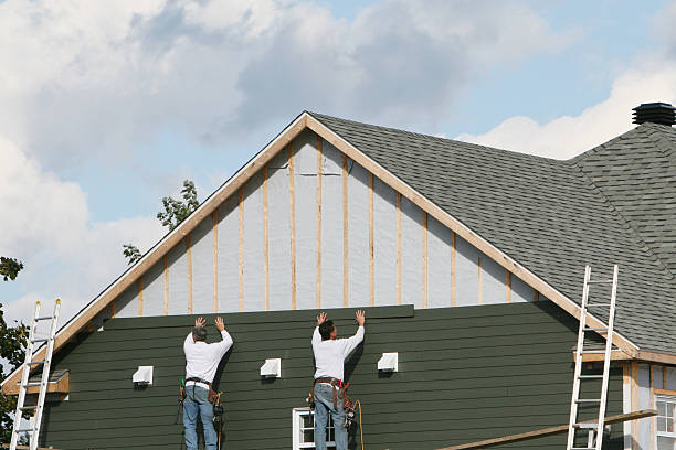 Professional Storm Damage Siding Repair technician working in Killingworth, CT
